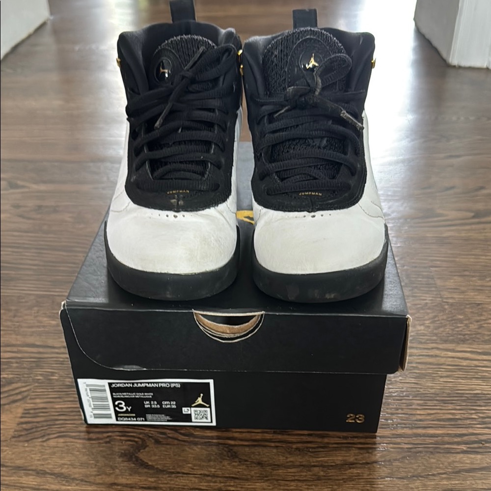 Jordan jump man pro black, white and gold